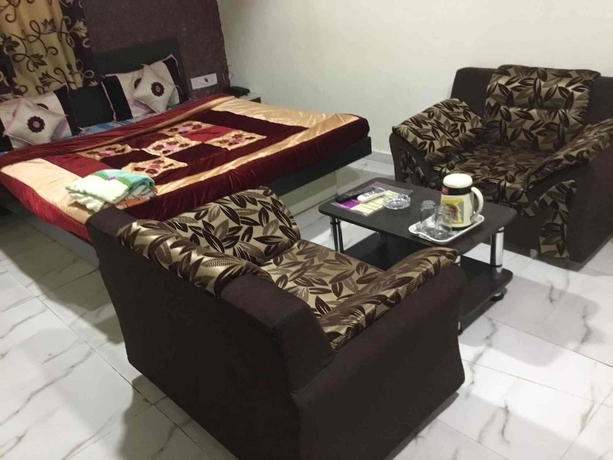 Imagen de la habitación del Hotel Kuber, Rajkot. Foto 3