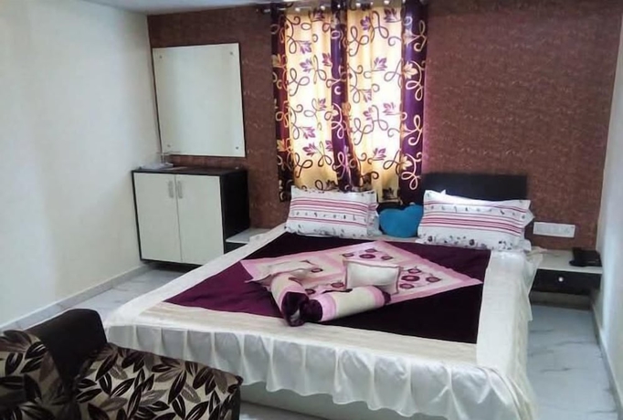 Imagen de la habitación del Hotel Kuber, Rajkot. Foto 5