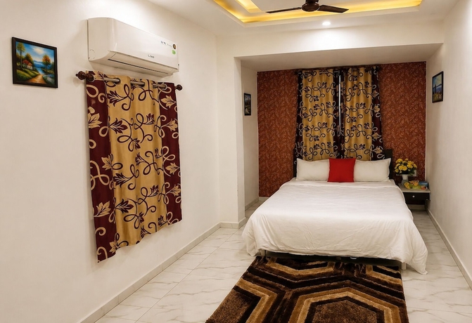 Imagen de la habitación del Hotel Kuber, Rajkot. Foto 9