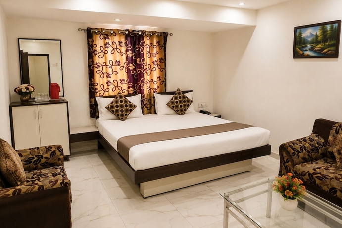 Imagen de la habitación del Hotel Kuber, Rajkot. Foto 10