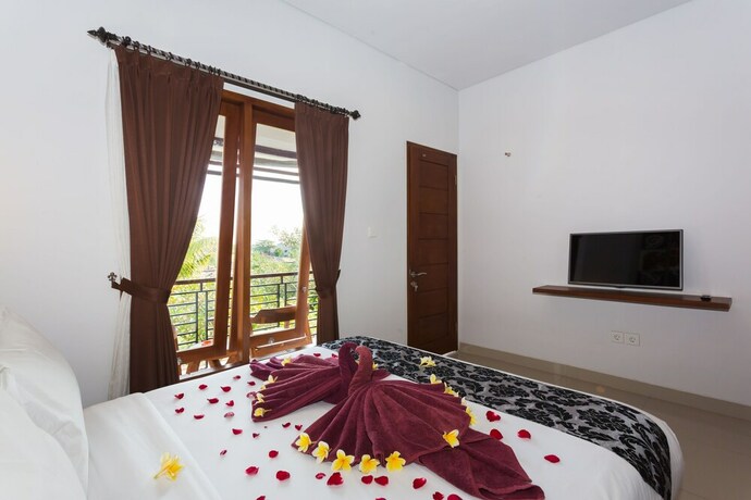 Imagen de la habitación del Hotel Kubu Bali Suite Seminyak. Foto 21