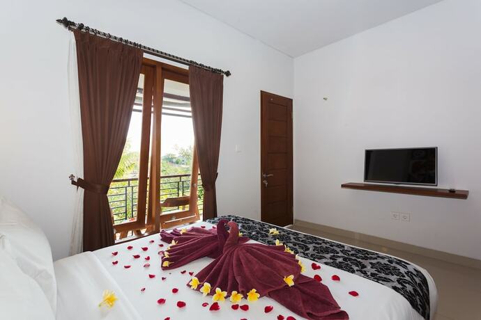 Imagen de la habitación del Hotel Kubu Bali Suite Seminyak. Foto 23