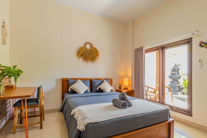 Imagen de la habitación del Hotel Kubu Deandari Guest House. Foto 5