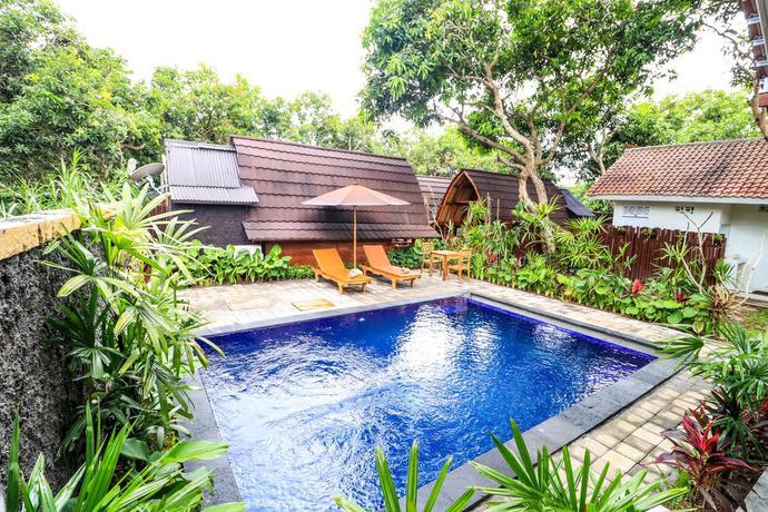 Imagen de la piscina del Hotel Kubu Kak Dudung Villa. Foto 9