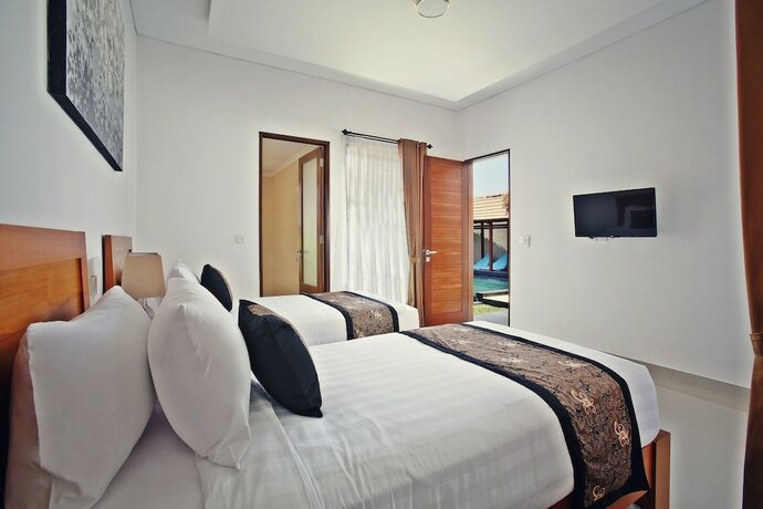 Imagen de la habitación del Hotel Kubu Manggala Villas Seminyak. Foto 20