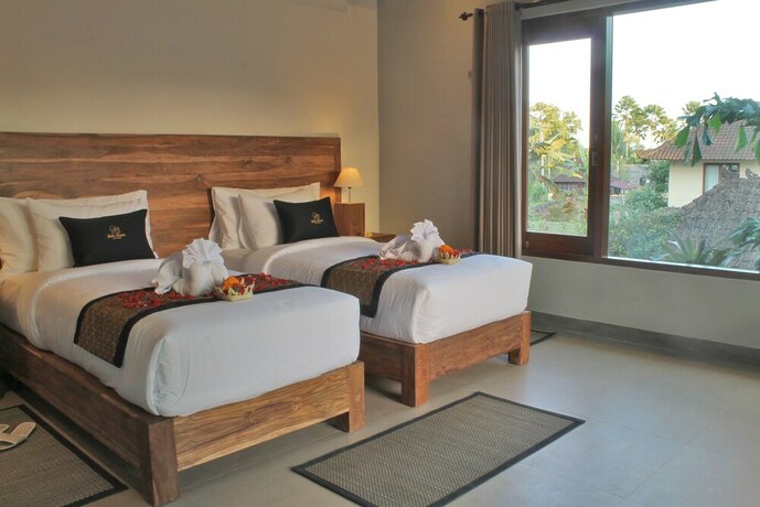 Imagen de la habitación del Hotel Kubu Rama Cottage. Foto 32