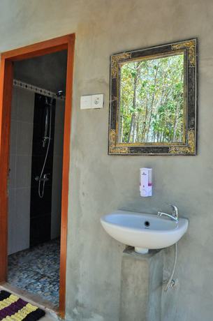 Imagen de la habitación del Hotel Kubu Sental Cottage. Foto 2