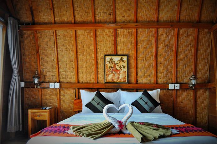Imagen de la habitación del Hotel Kubu Sental Cottage. Foto 8