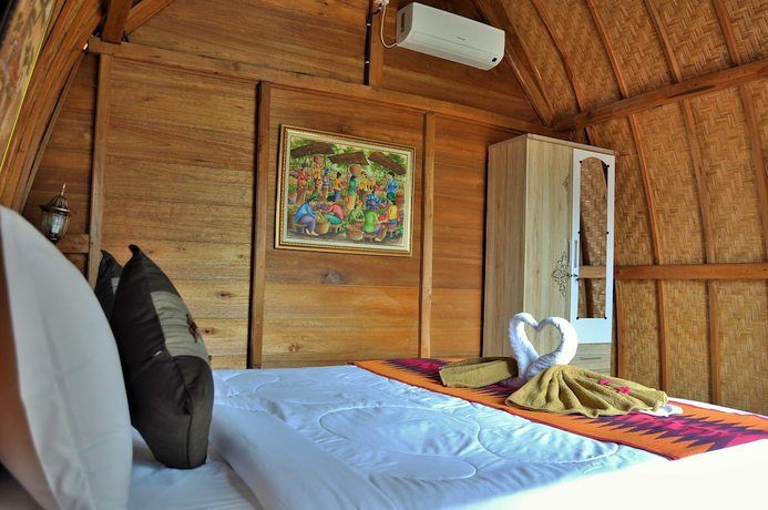 Imagen de la habitación del Hotel Kubu Sental Cottage. Foto 11