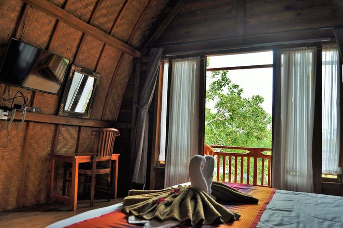 Imagen de la habitación del Hotel Kubu Sental Cottage. Foto 13