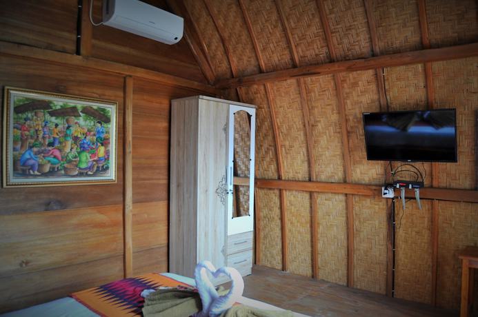 Imagen de la habitación del Hotel Kubu Sental Cottage. Foto 18