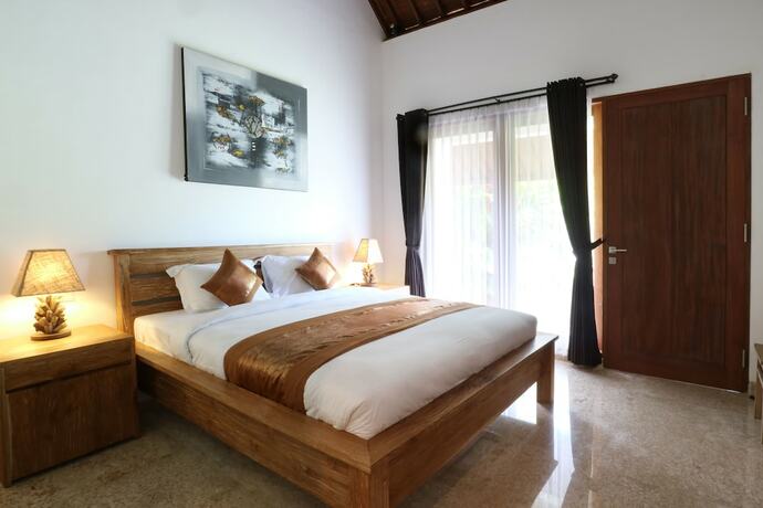 Imagen de la habitación del Hotel Kubu Taulan. Foto 5