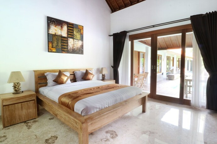 Imagen de la habitación del Hotel Kubu Taulan. Foto 7