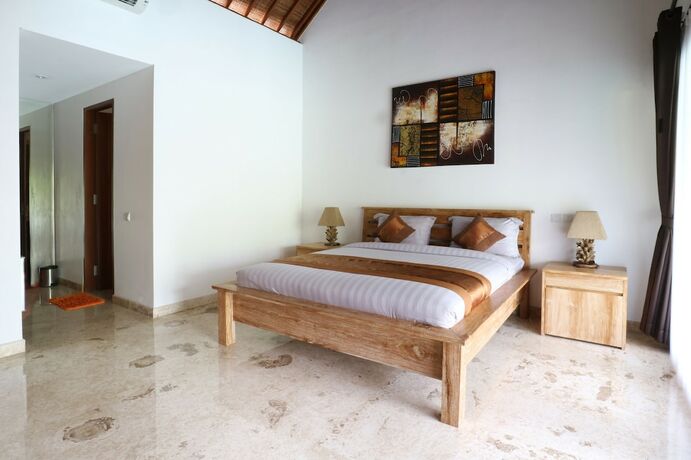 Imagen de la habitación del Hotel Kubu Taulan. Foto 14