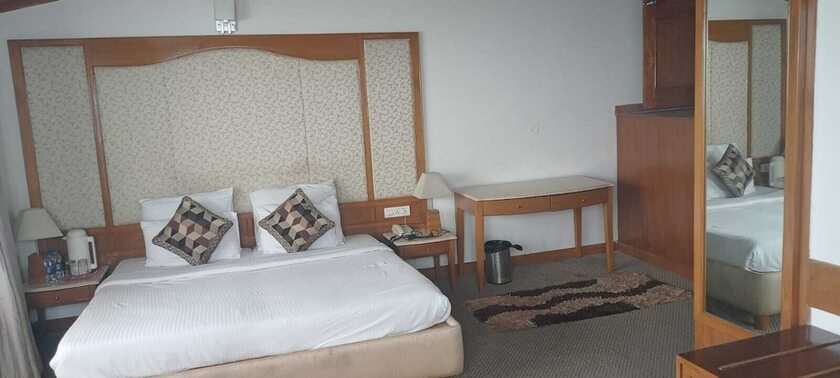 Imagen de la habitación del Hotel Kufri Holiday Resort. Foto 17