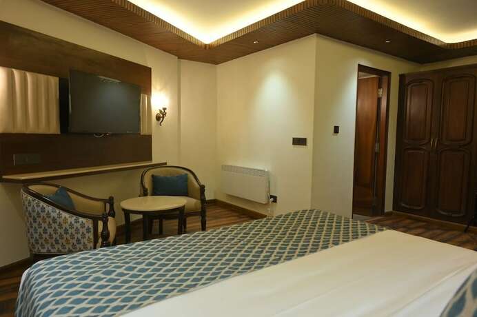 Imagen de la habitación del Hotel Kufri Holiday Resort. Foto 18