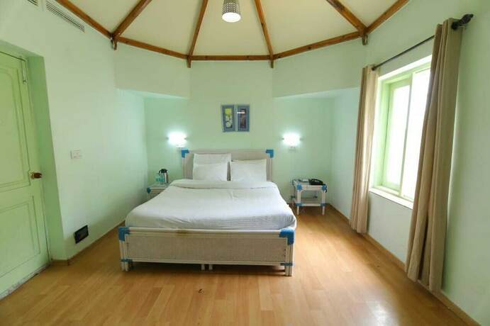 Imagen de la habitación del Hotel Kufri Holiday Resort. Foto 19