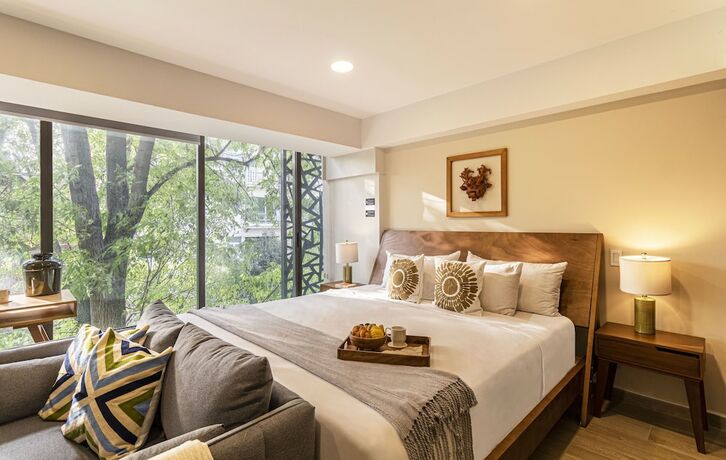 Imagen de la habitación del Hotel Kukun Tonala 30 Roma. Foto 13