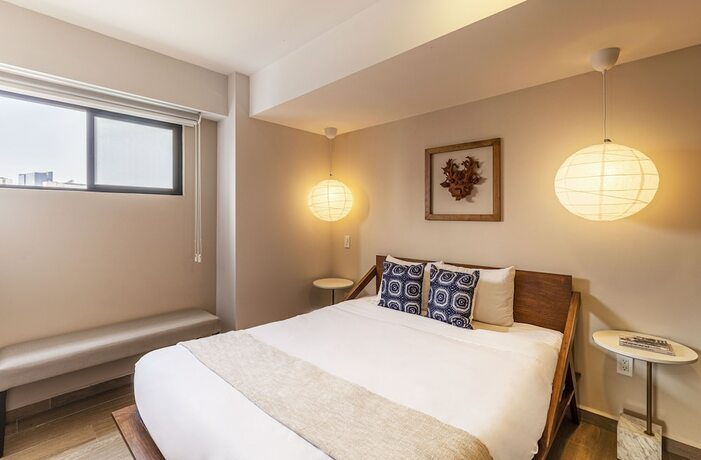 Imagen de la habitación del Hotel Kukun Tonala 30 Roma. Foto 18