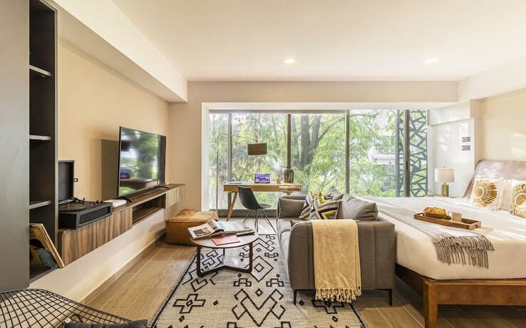 Imagen de la habitación del Hotel Kukun Tonala 30 Roma. Foto 20