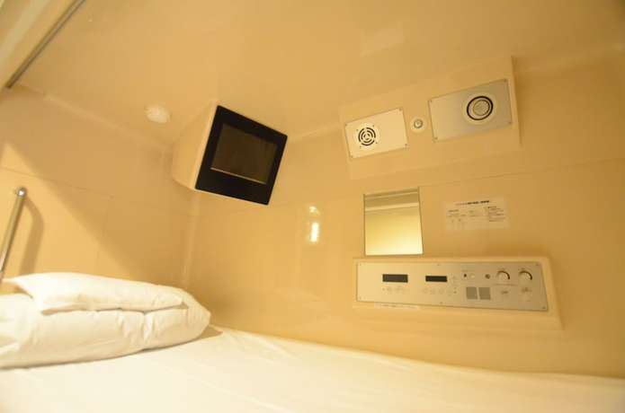 Imagen de la habitación del Hotel Kumamoto Capsule - Hostel, Caters To Men. Foto 2