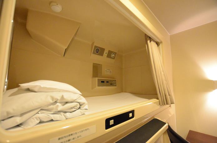 Imagen de la habitación del Hotel Kumamoto Capsule - Hostel, Caters To Men. Foto 9