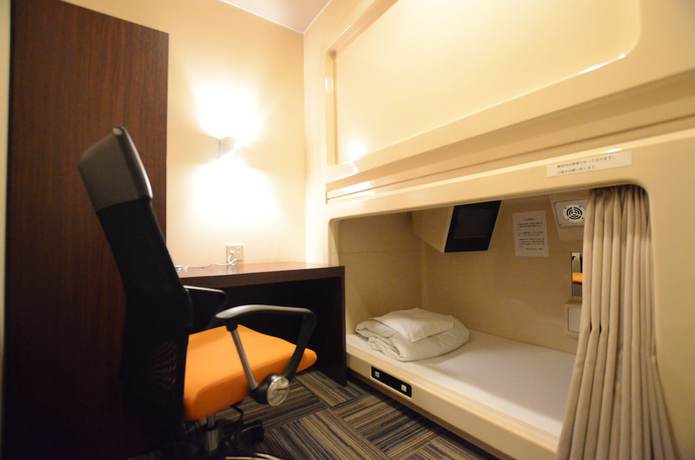 Imagen de la habitación del Hotel Kumamoto Capsule - Hostel, Caters To Men. Foto 12