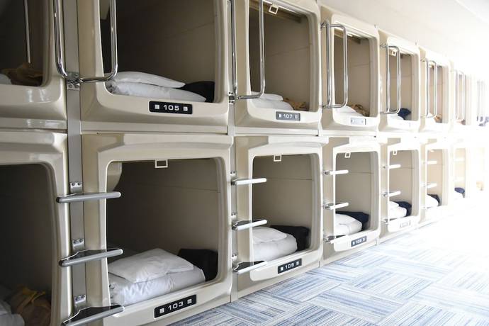 Imagen de la habitación del Hotel Kumamoto Capsule - Hostel, Caters To Men. Foto 13
