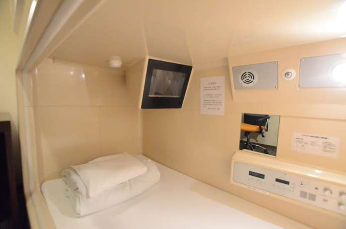 Imagen de la habitación del Hotel Kumamoto Capsule - Hostel, Caters To Men. Foto 16