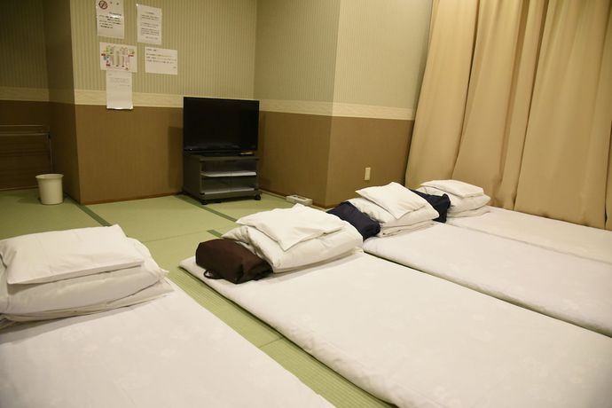 Imagen de la habitación del Hotel Kumamoto Capsule - Hostel, Caters To Men. Foto 20