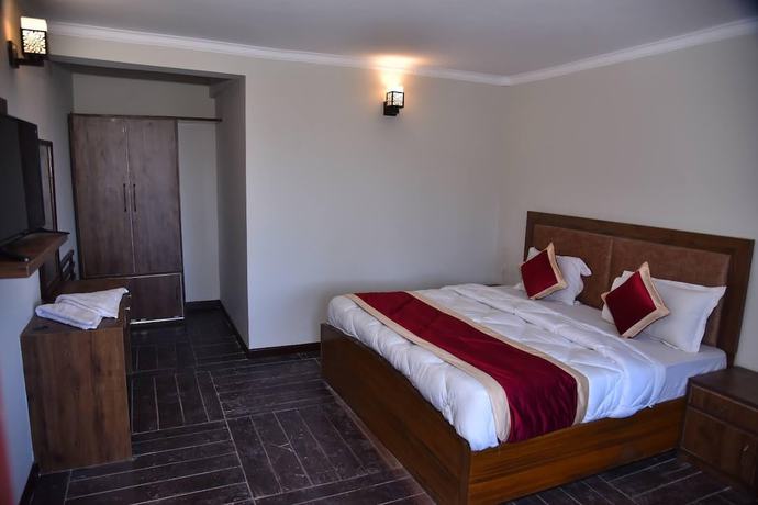 Imagen de la habitación del Hotel Kumaon Roop Resort. Foto 8