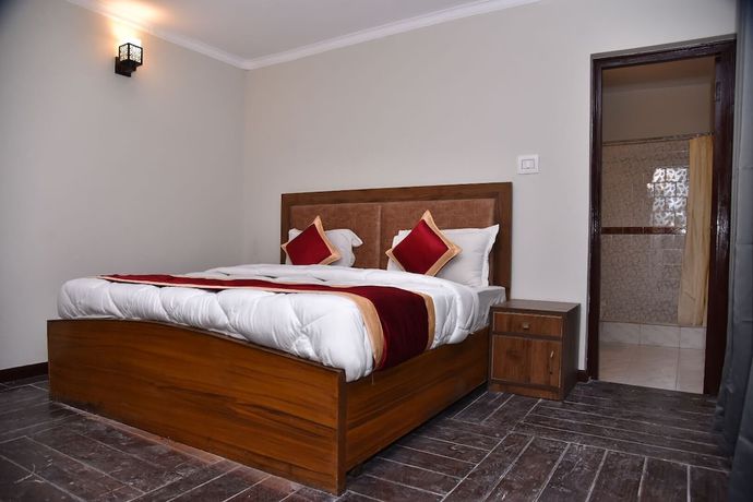 Imagen de la habitación del Hotel Kumaon Roop Resort. Foto 10