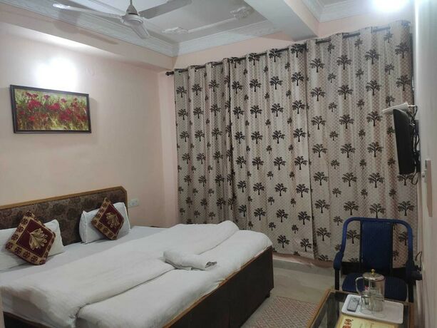 Imagen de la habitación del Hotel Kumar Residency, Dharamsala. Foto 18