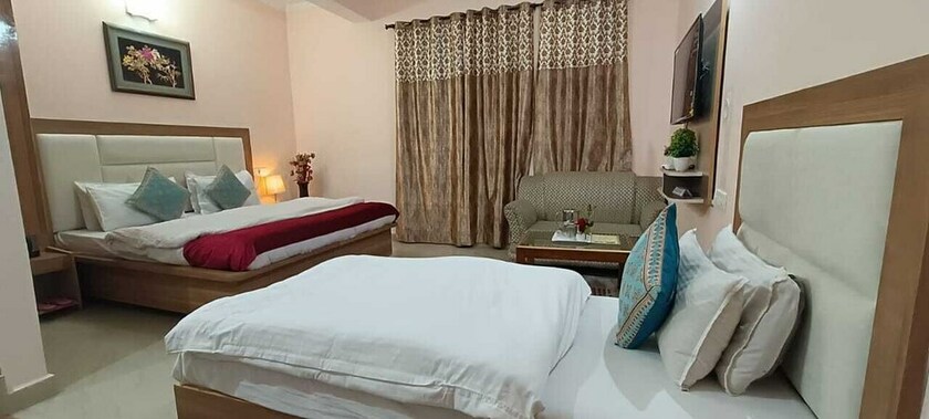 Imagen de la habitación del Hotel Kumar Residency, Dharamsala. Foto 19