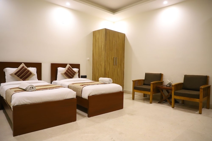 Imagen de la habitación del Hotel Kumar Residency. Foto 7