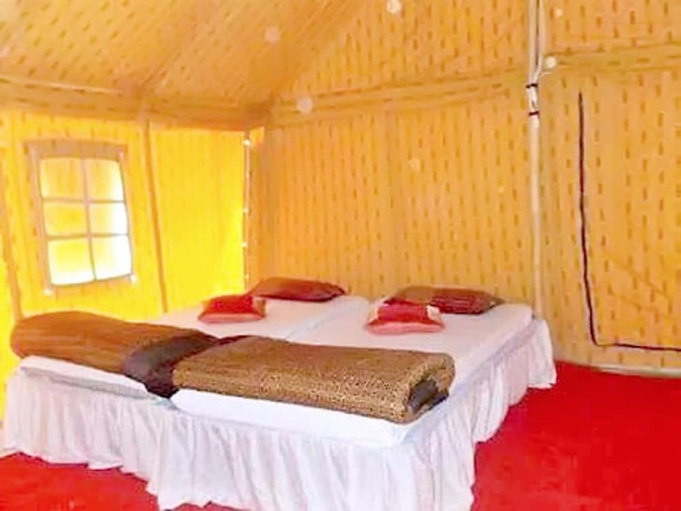 Imagen de la habitación del Hotel Kumbh Luxury Tents. Foto 17