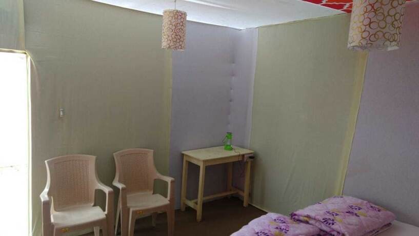 Imagen de la habitación del Hotel Kumbh Luxury Tents. Foto 18