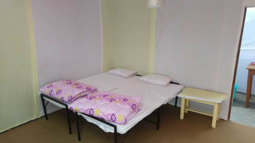 Imagen de la habitación del Hotel Kumbh Luxury Tents. Foto 20