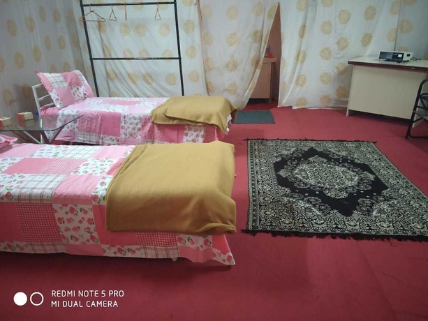 Imagen de la habitación del Hotel Kumbh Mela Vedic Tents. Foto 10