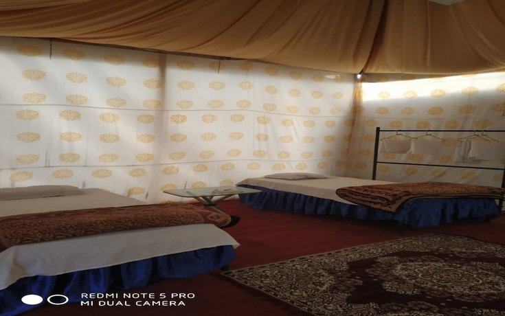 Imagen de la habitación del Hotel Kumbh Mela Vedic Tents. Foto 11