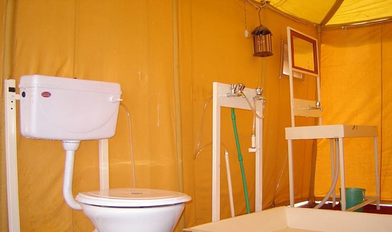 Imagen de la habitación del Hotel Kumbh Mela Vedic Tents. Foto 14