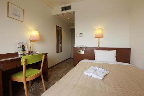 Imagen de la habitación del Hotel Kumegawa Wing. Foto 18
