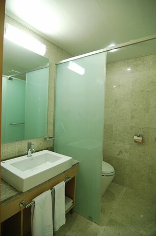 Imagen de la habitación del Hotel Kumho Jeju Resort. Foto 21