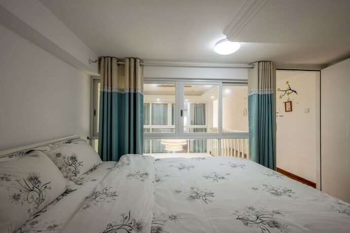 Imagen de la habitación del Hotel Kun Jiang Service Apartment Chimelong. Foto 20