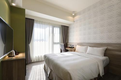 Imagen de la habitación del Hotel Kun Tour. Foto 6