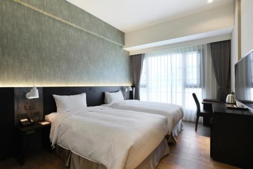 Imagen de la habitación del Hotel Kun Tour. Foto 7