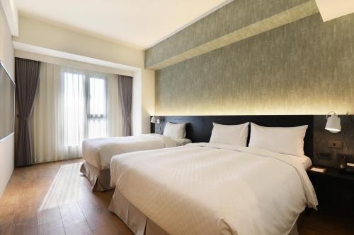 Imagen de la habitación del Hotel Kun Tour. Foto 8