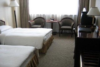 Imagen de la habitación del Hotel KunMing. Foto 9
