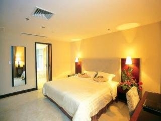 Imagen de la habitación del Hotel KunMing. Foto 10