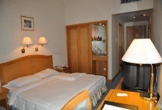 Imagen de la habitación del Hotel KunMing. Foto 12